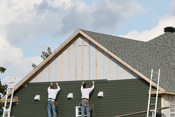 Professional Siding technician working in Baltic, CT